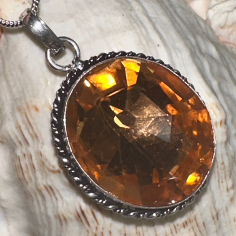Sparkly Whiskey Topaz facet cut pendant set in a beautiful 925 setting